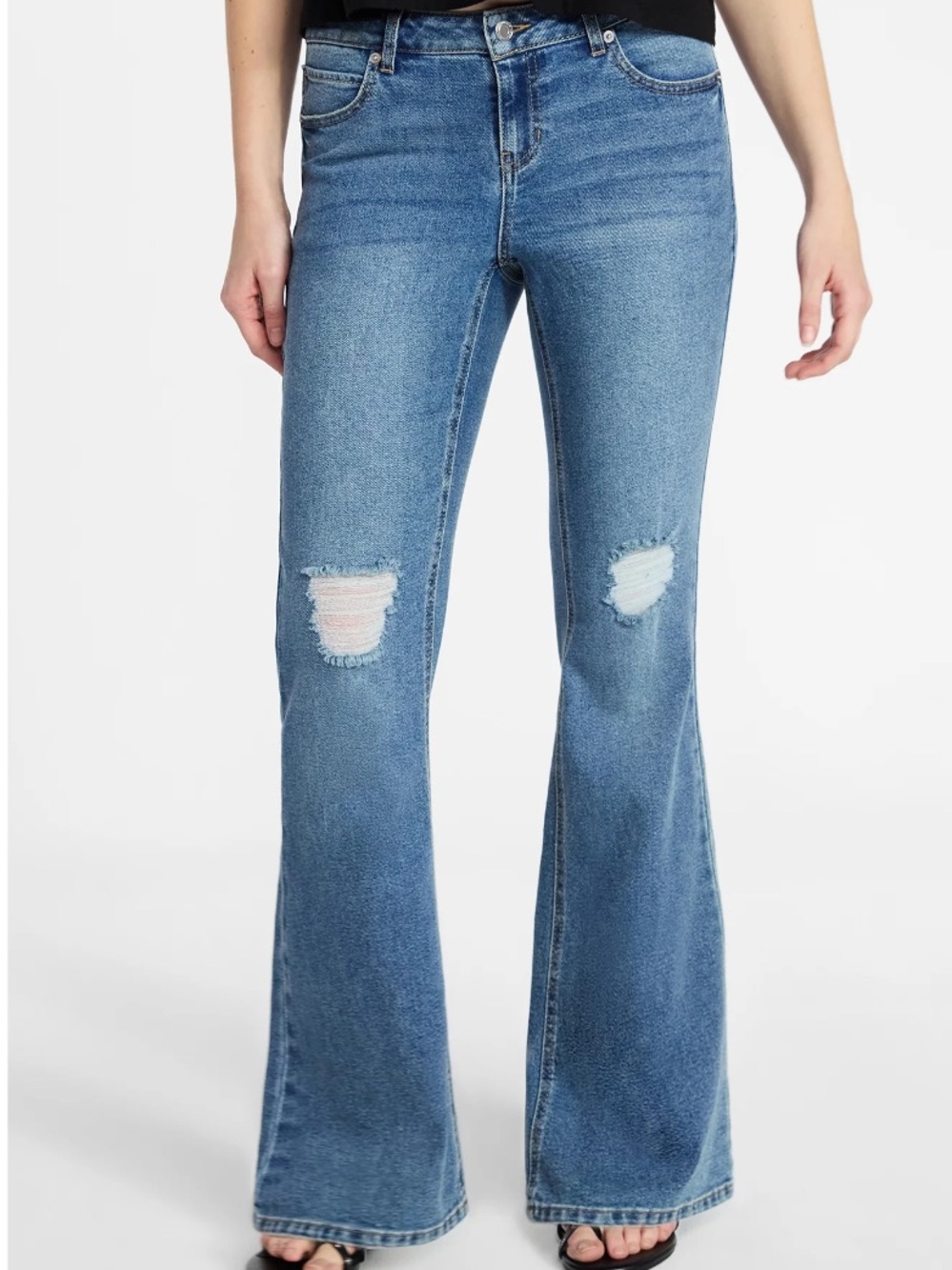 Flare jeans with rips and mid rise